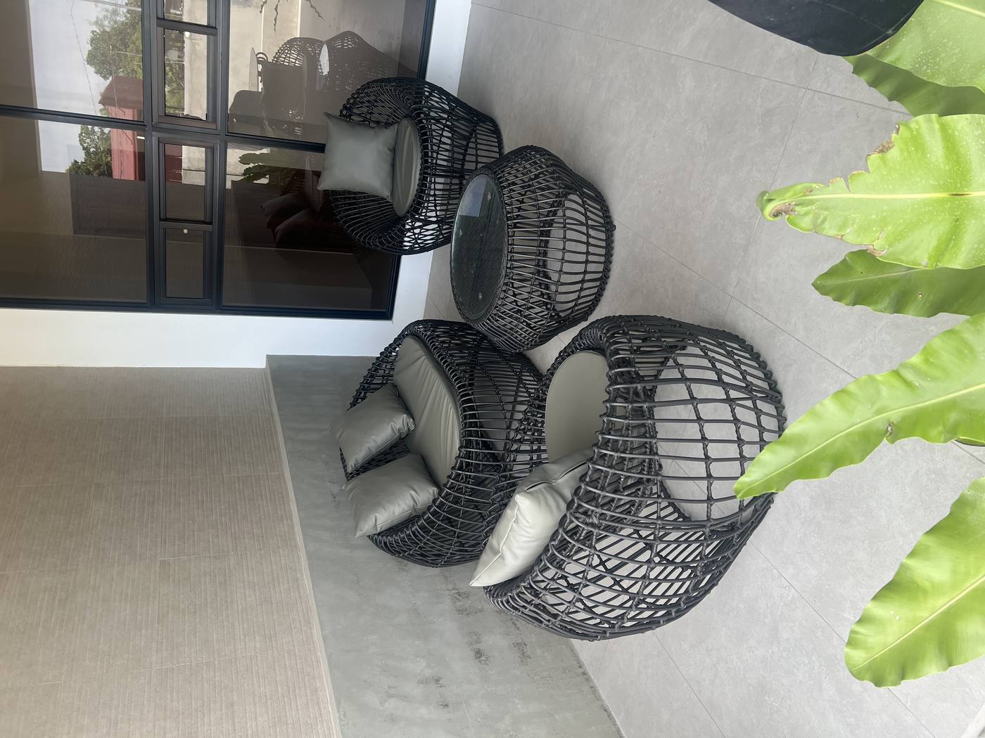 Black outdoor wicker lounge